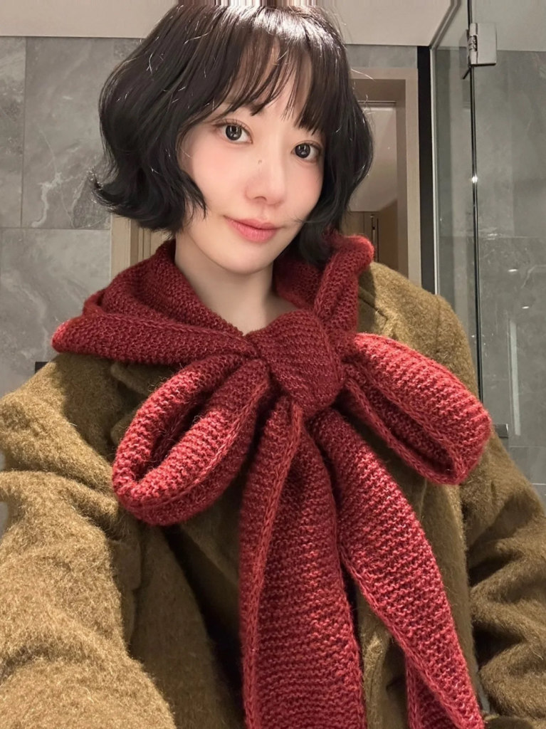 Sakura’s Hand-Knitted Hooded Scarf Shows Her Love for Craft