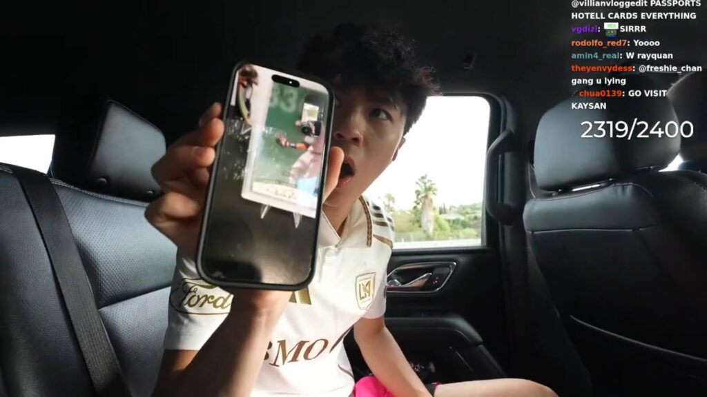 Kaysan Shows Card Collection to Ray in LA