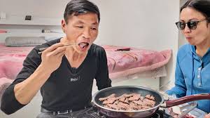 North Korean Experiences Korean BBQ for the First Time