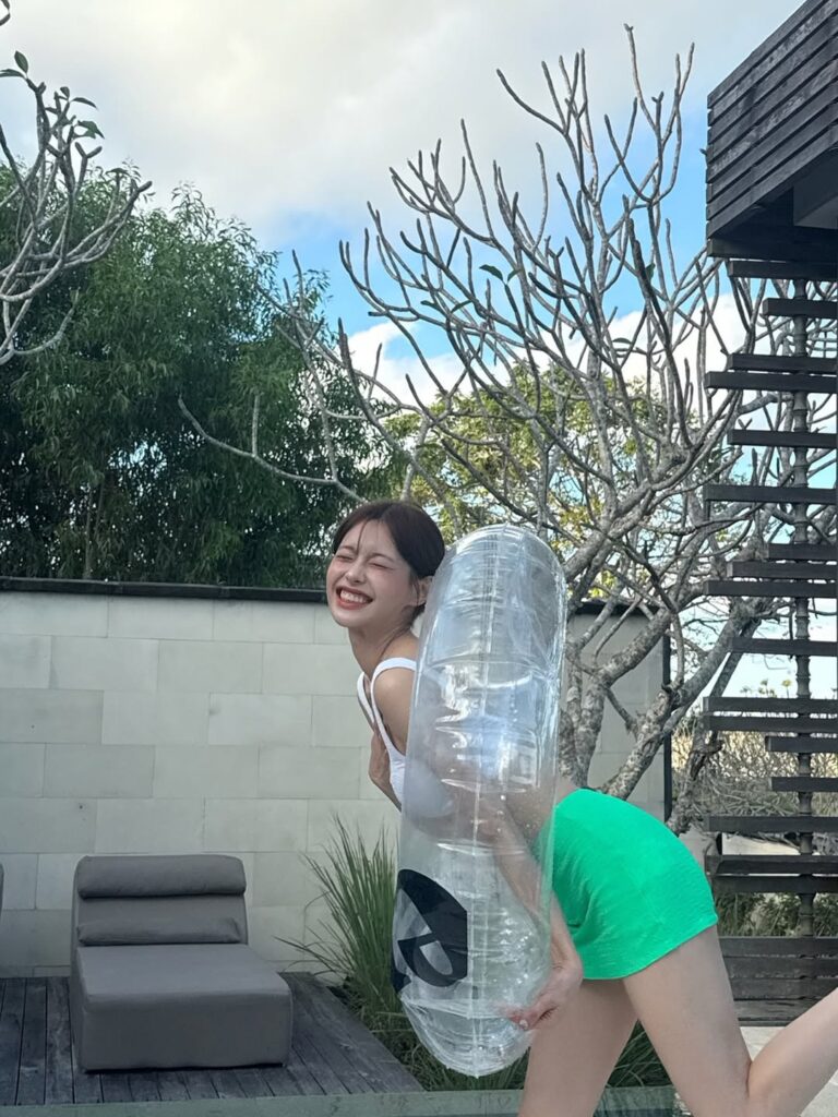 Chuu Enjoys a Relaxing and Joyful Time at the Pool